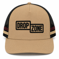 Front angled view of Drop Zone Side-Stripe Trucker Golf Cap in Tan & Black