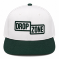 Front angled view of Drop Zone Two-Tone Buckle Golf Cap in White & Green