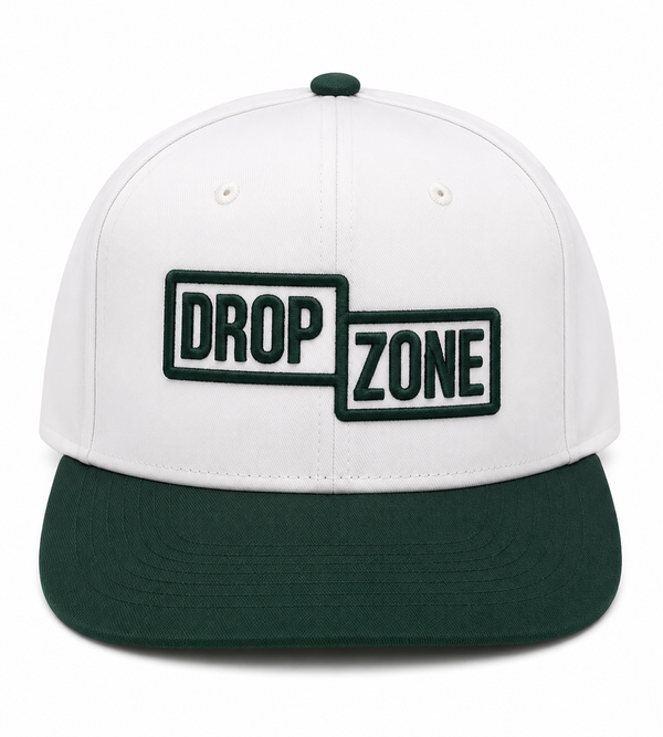 Front angled view of Drop Zone Two-Tone Buckle Golf Cap in White & Green