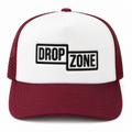 Front angled view of Drop Zone Mesh-Back Trucker Golf Cap in Maroon & White