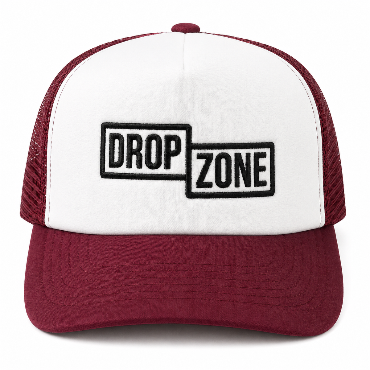 Front angled view of Drop Zone Mesh-Back Trucker Golf Cap in Maroon & White